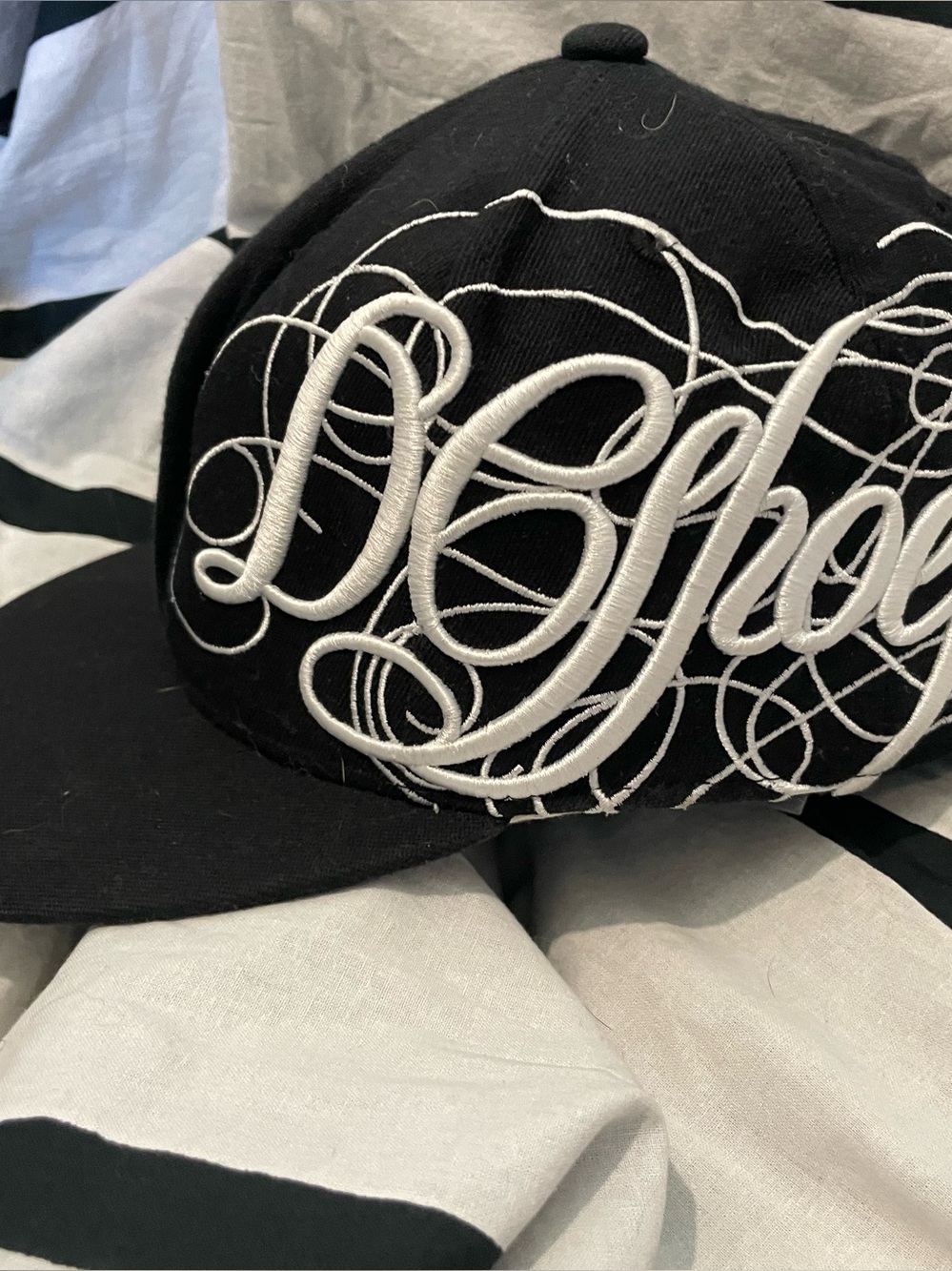 DC Black Cap with White Embroidered Script